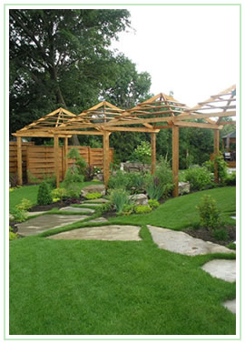 M. Residence backyard stone path and wood structures