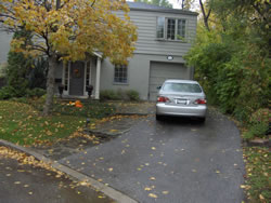 Before: paved driveway